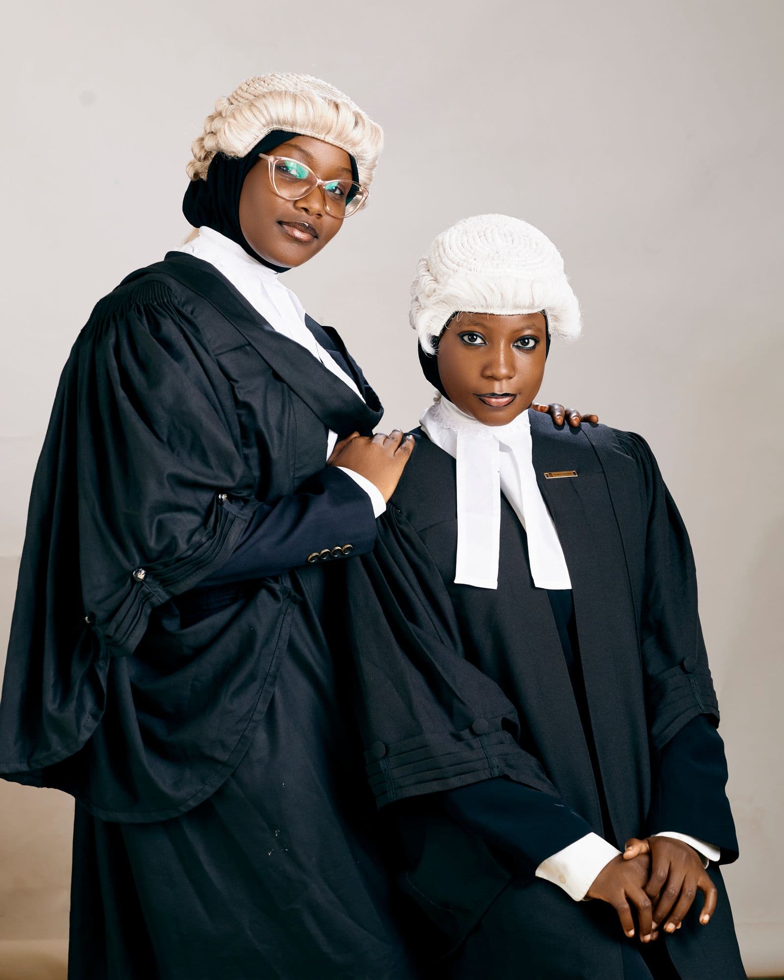 Two Nigerian lawyers in traditional court attire